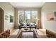 Inviting living room with large windows and comfortable seating at 3712 Wolff St, Denver, CO 80212