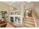 Cozy living room with a fireplace and built-in shelving at 3712 Wolff St, Denver, CO 80212