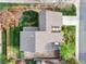 Aerial view of the home showing the roof, backyard, patio, driveway, and surrounding landscaping at 3706 E Easter Dr, Centennial, CO 80122