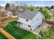 Two-story home boasts a spacious, green backyard with a well-maintained lawn and privacy fence at 3706 E Easter Dr, Centennial, CO 80122