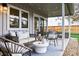 Relaxing backyard patio featuring comfortable seating, a rug, and decorative pillows at 3706 E Easter Dr, Centennial, CO 80122