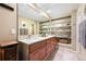 Bathroom with granite countertops, a double vanity, and ample storage space at 3706 E Easter Dr, Centennial, CO 80122