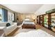 Spacious bedroom with carpet, large closet, and a couch, great for relaxing and unwinding at 3706 E Easter Dr, Centennial, CO 80122