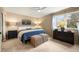 Cozy bedroom featuring natural light, ceiling fan, and stylish decor and furnishings at 3706 E Easter Dr, Centennial, CO 80122