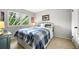 Comfortable bedroom with plush carpet and a light-filled window providing ample natural light at 3706 E Easter Dr, Centennial, CO 80122