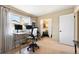 Office space featuring natural light, two computer monitors, and modern furniture at 3706 E Easter Dr, Centennial, CO 80122