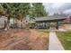 Community pavilion with picnic tables and barbecue, near green space and mature trees for shade at 3706 E Easter Dr, Centennial, CO 80122