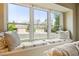 Comfortable window seat featuring bright natural light and backyard views at 3706 E Easter Dr, Centennial, CO 80122