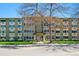 Exterior view of building 755 S Alton Way featuring green space, street views and visible unit patios at 755 S Alton Way # 8D, Denver, CO 80247