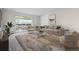 Inviting living room features a balcony and neutral decor, perfect for relaxation at 755 S Alton Way # 8D, Denver, CO 80247