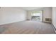 Bright living room with balcony access, offering an airy and open space at 755 S Alton Way # 8D, Denver, CO 80247