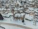 Aerial view of house and neighborhood in winter at 1466 Elmwood Ln, Denver, CO 80221