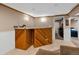 Finished basement with wet bar and additional living space at 1466 Elmwood Ln, Denver, CO 80221