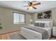 Main bedroom with ceiling fan and stylish decor at 1466 Elmwood Ln, Denver, CO 80221