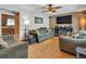 Spacious living room featuring hardwood floors, and a cozy fireplace at 1466 Elmwood Ln, Denver, CO 80221