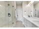 Bright bathroom with sleek glass shower and modern fixtures at 10105 Morrison Rd, Lakewood, CO 80227