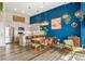 Open concept living area with modern kitchen, dining space, and stylish decor at 10105 Morrison Rd, Lakewood, CO 80227