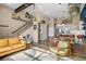 Inviting open-concept living area with modern decor, natural light, and a cozy ambiance at 10105 Morrison Rd, Lakewood, CO 80227