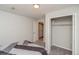 Bedroom with carpeting, a closet, and natural light at 155 Xenon St # 33, Denver, CO 80228