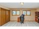 Bedroom featuring carpeting, a window, and an office space at 155 Xenon St # 33, Denver, CO 80228
