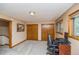 Bedroom with carpeting, a window, two closets, and an office space at 155 Xenon St # 33, Denver, CO 80228