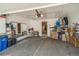 Spacious garage with ample storage space and a work area, perfect for projects and organization at 155 Xenon St # 33, Denver, CO 80228