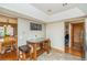 Bright kitchen showcasing stainless appliances, a breakfast bar, and adjacent dining area at 155 Xenon St # 33, Denver, CO 80228