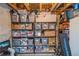 Organized storage area with shelving and bins for efficient organization and maximizing space at 155 Xenon St # 33, Denver, CO 80228