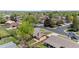 Charming neighborhood featuring a lovely mix of homes and tree-lined streets with a view of the city skyline at 1195 S Kendall St, Lakewood, CO 80232