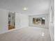 A finished basement with an open doorway and street view at 1195 S Kendall St, Lakewood, CO 80232