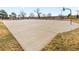 Large, open-air basketball court next to park offers recreational opportunities and space for outdoor activities at 1195 S Kendall St, Lakewood, CO 80232