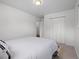 A bedroom with closet space and neutral décor at 1195 S Kendall St, Lakewood, CO 80232