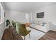Bright living room with neutral colors, stylish furniture, and wood-look flooring at 1195 S Kendall St, Lakewood, CO 80232