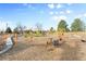 A colorful community playground with various play structures, swings, and slides for active outdoor fun at 1195 S Kendall St, Lakewood, CO 80232
