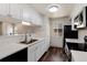 Well-lit kitchen featuring stainless steel appliances, sleek countertops, and ample cabinet space at 7700 W Glasgow Pl # 24C, Littleton, CO 80128