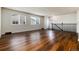 Spacious living room featuring sleek floors, natural light, and an open layout for modern living at 7700 W Glasgow Pl # 24C, Littleton, CO 80128