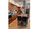 Modern kitchen featuring stainless steel appliances and a center island at 3098 W 39Th Ave, Denver, CO 80211