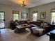 Comfortable living room with a plush sectional sofa and natural light at 3098 W 39Th Ave, Denver, CO 80211