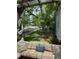 Comfortable outdoor seating area with a pergola, offering a serene view of the yard at 3098 W 39Th Ave, Denver, CO 80211