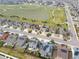 Aerial view of the neighborhood showcasing proximity to neighborhood park, roadways, and other residences at 5362 E 140Th Pl, Thornton, CO 80602