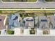 Aerial view of neighborhood showcasing roof lines, backyard patios, and front yard landscaping at 5362 E 140Th Pl, Thornton, CO 80602