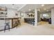 Finished basement features a wet bar and plenty of seating for entertaining at 5362 E 140Th Pl, Thornton, CO 80602