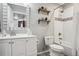 Stylish bathroom with subway tile, shower and sink with decorative shelving at 5362 E 140Th Pl, Thornton, CO 80602