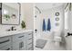 Well-lit bathroom featuring a gray vanity, modern fixtures, and a combination shower and tub at 5362 E 140Th Pl, Thornton, CO 80602