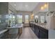 Luxury bathroom with soaking tub, frameless shower, dual vanity and scenic views at 9433 Torrey Way, Arvada, CO 80007