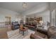 Spacious living room with comfortable seating and an open layout at 9433 Torrey Way, Arvada, CO 80007