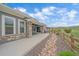 Beautiful patio view showcasing outdoor living space and landscaped yard at 9433 Torrey Way, Arvada, CO 80007