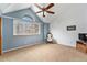 Bright bedroom with vaulted ceiling, neutral carpet, and window at 11362 W Frost Ave, Littleton, CO 80127