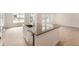 Close-up of a kitchen island with a sink, dishwasher, and dark countertops at 24704 E Pacific Pl, Aurora, CO 80018