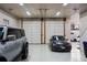 Spacious four-car garage offers ample space for vehicles and storage with great lighting at 7130 Independence St, Arvada, CO 80004